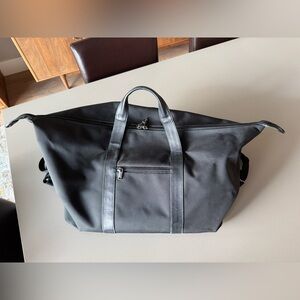 Tumi Alpha Black Travel Bag with Front Pocket